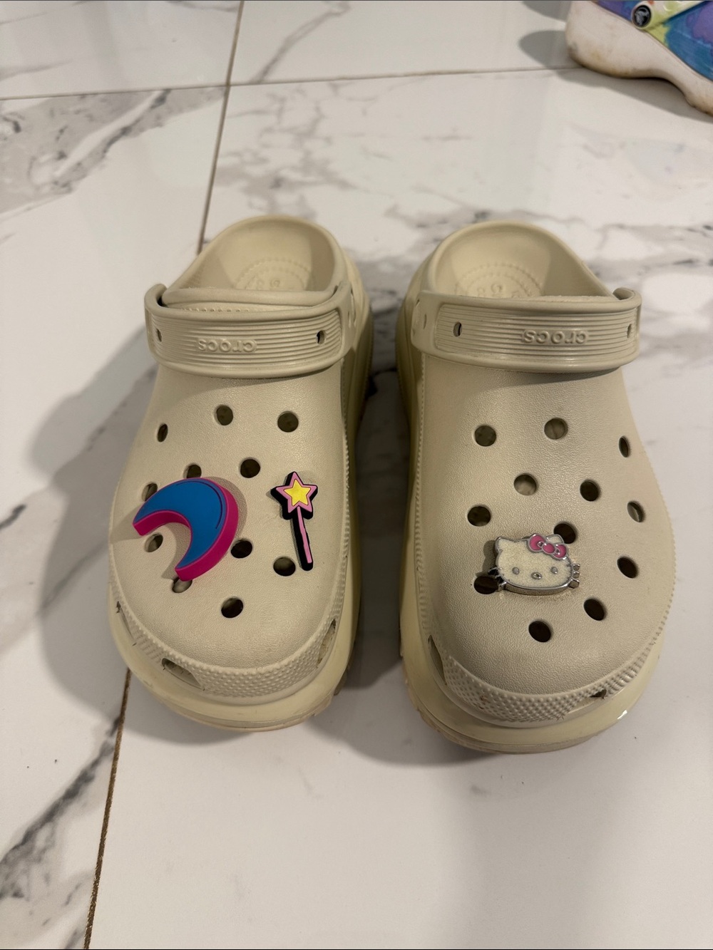 CROCS Kids Cream Clogs with Colorful Charm Accents